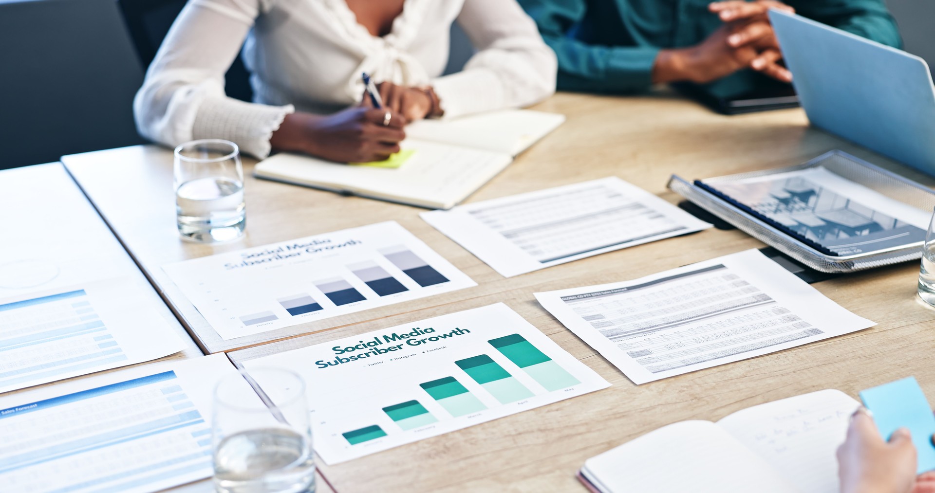 Business hands, documents and notes on graphs, charts and statistics for market research. Colleagues, data analyst with feedback or project management, plan and teamwork for growth ideas in meeting